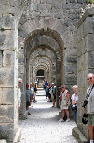 a Ya'lla church group playing in the support arches for the Temple of Trajan, Pergamum, Turkey